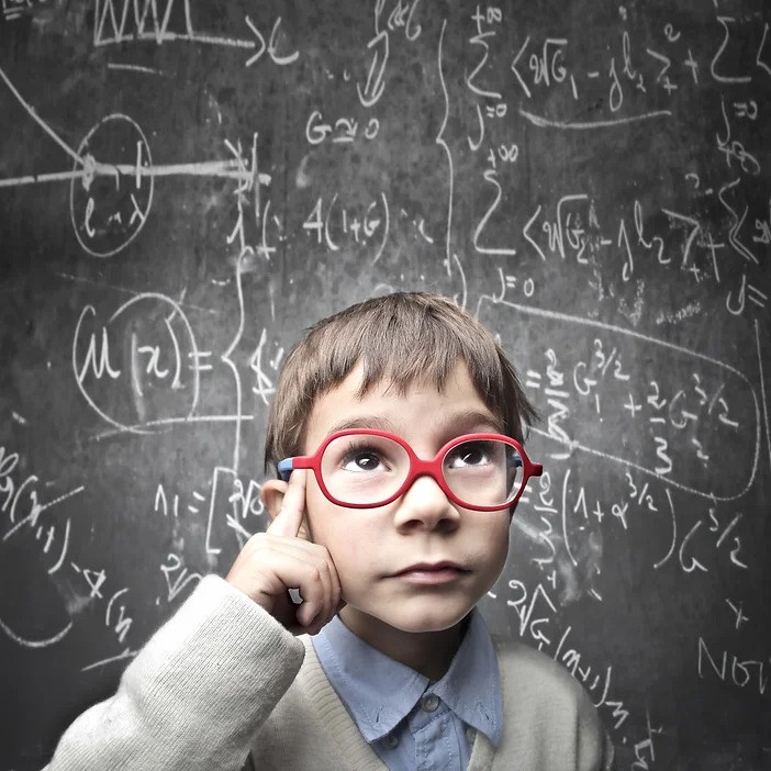 Thinking-child-with-a-blackboard-in-the-.jpg